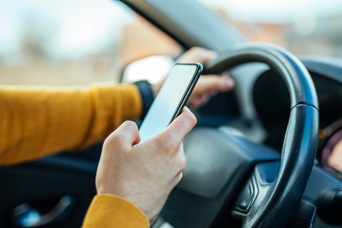 Man on phone while driving