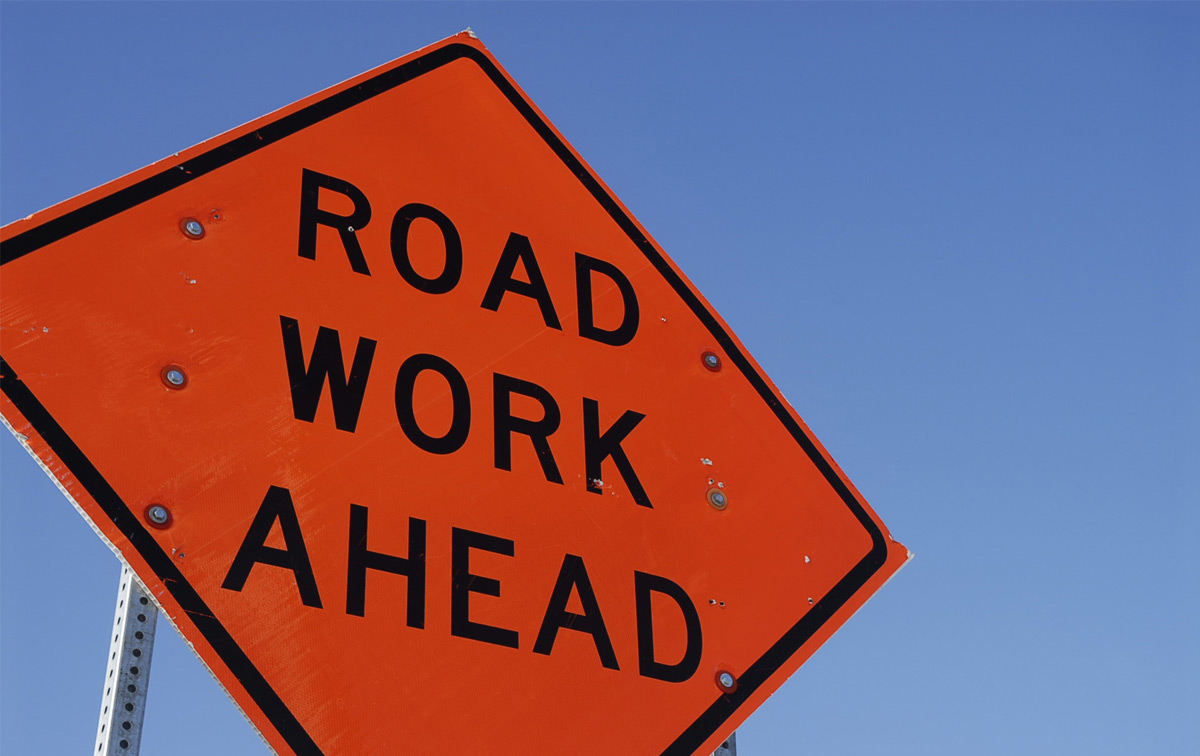 construction sign on side of road