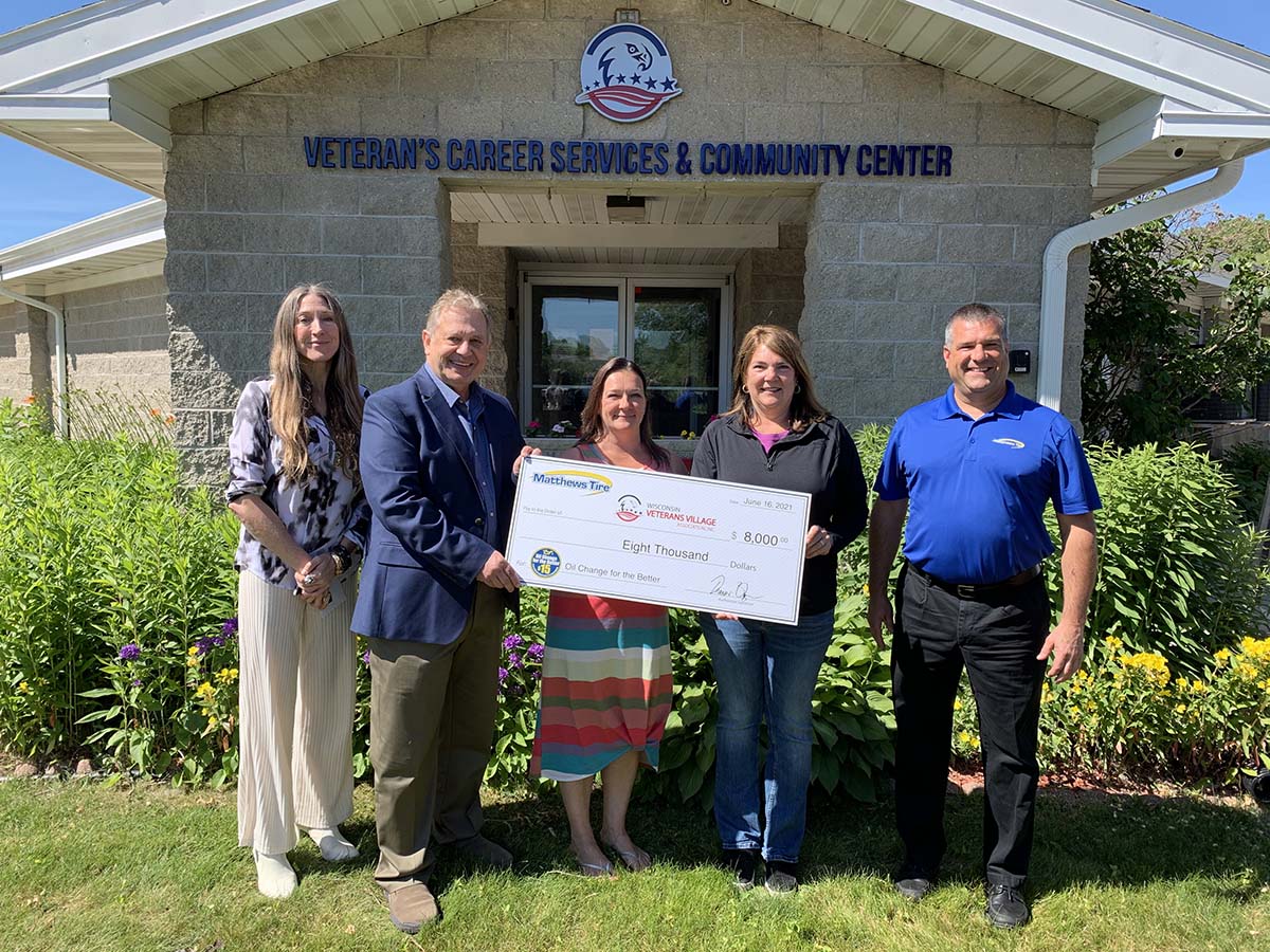 Matthews Tire presenting $8,000 check to Wisconsin Veterans Village Association