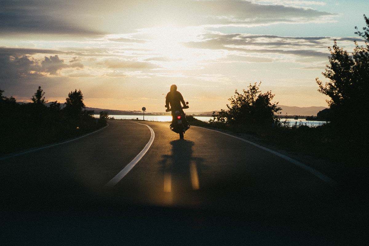 Motorcyle driving on back country road