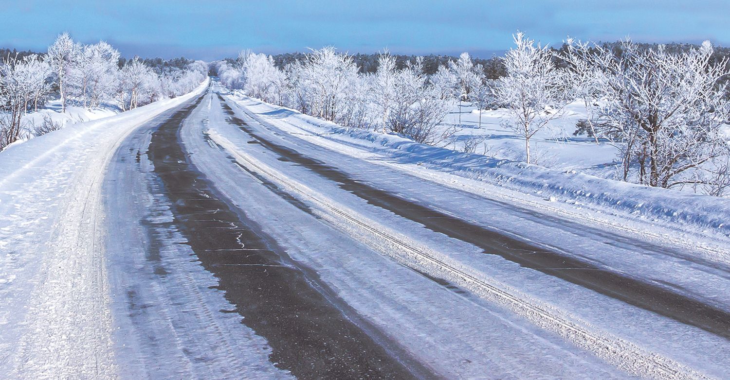 snow covered road in winter