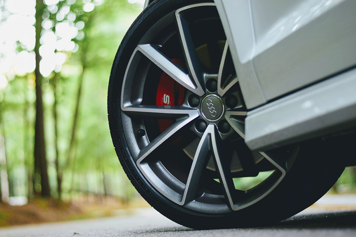 Brake rotor and brake pads on vehicle while in for a brake repair service