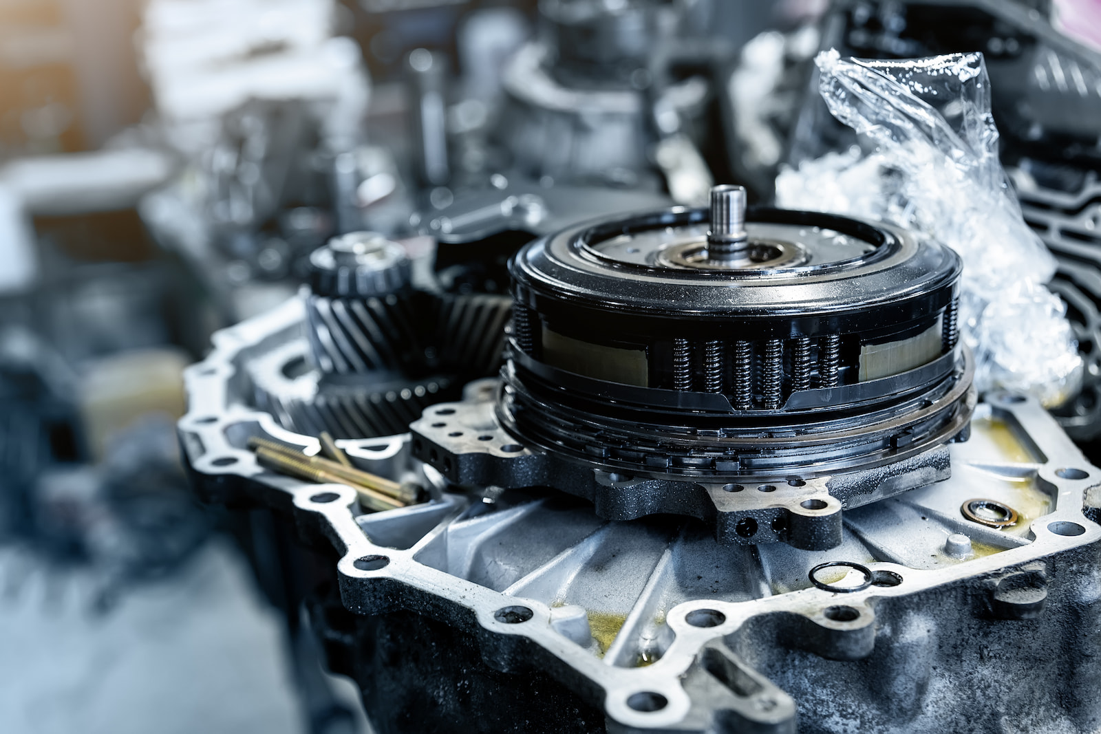 Partially disassembled automatic transmission during repair service in Fond du Lac, WI.