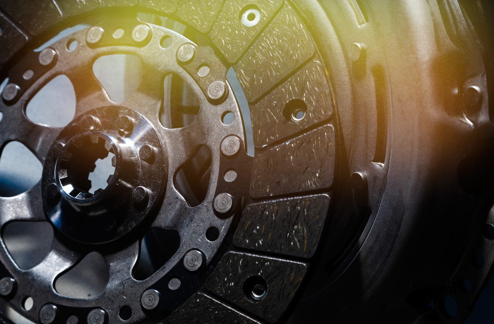 Detailed close-up of a clutch disc component during transmission service in Waupaca, WI.