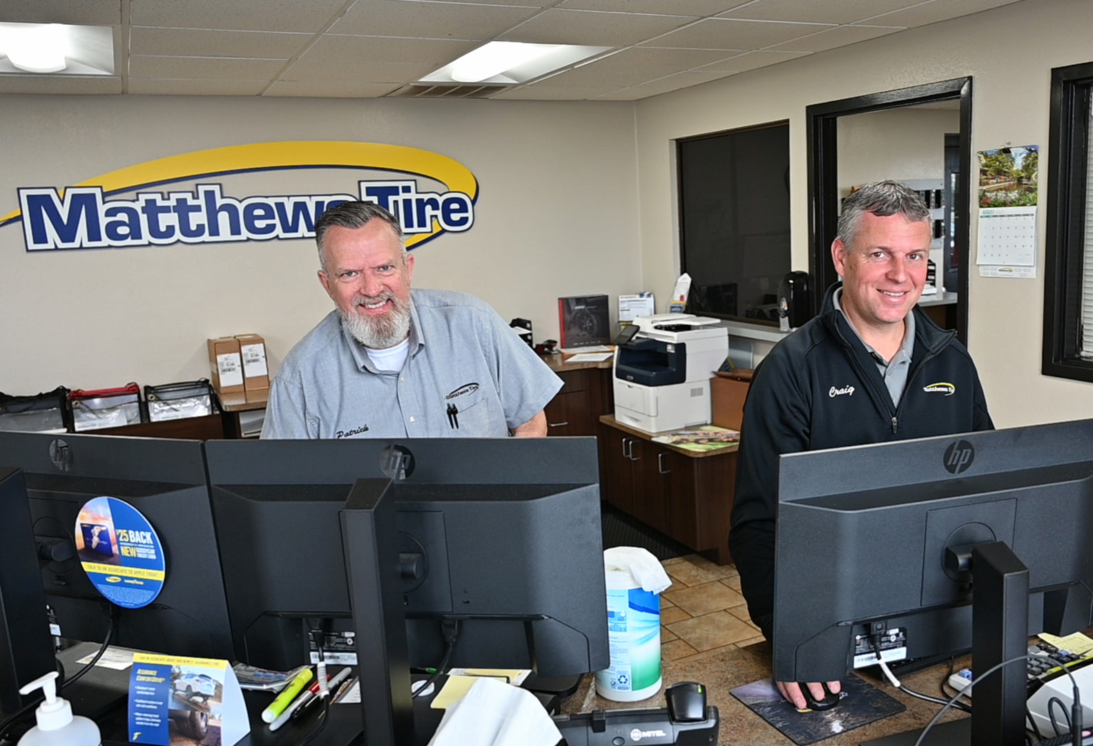 Friendly Matthews Tire staff welcoming customers for wheel alignment in Green Bay, WI.