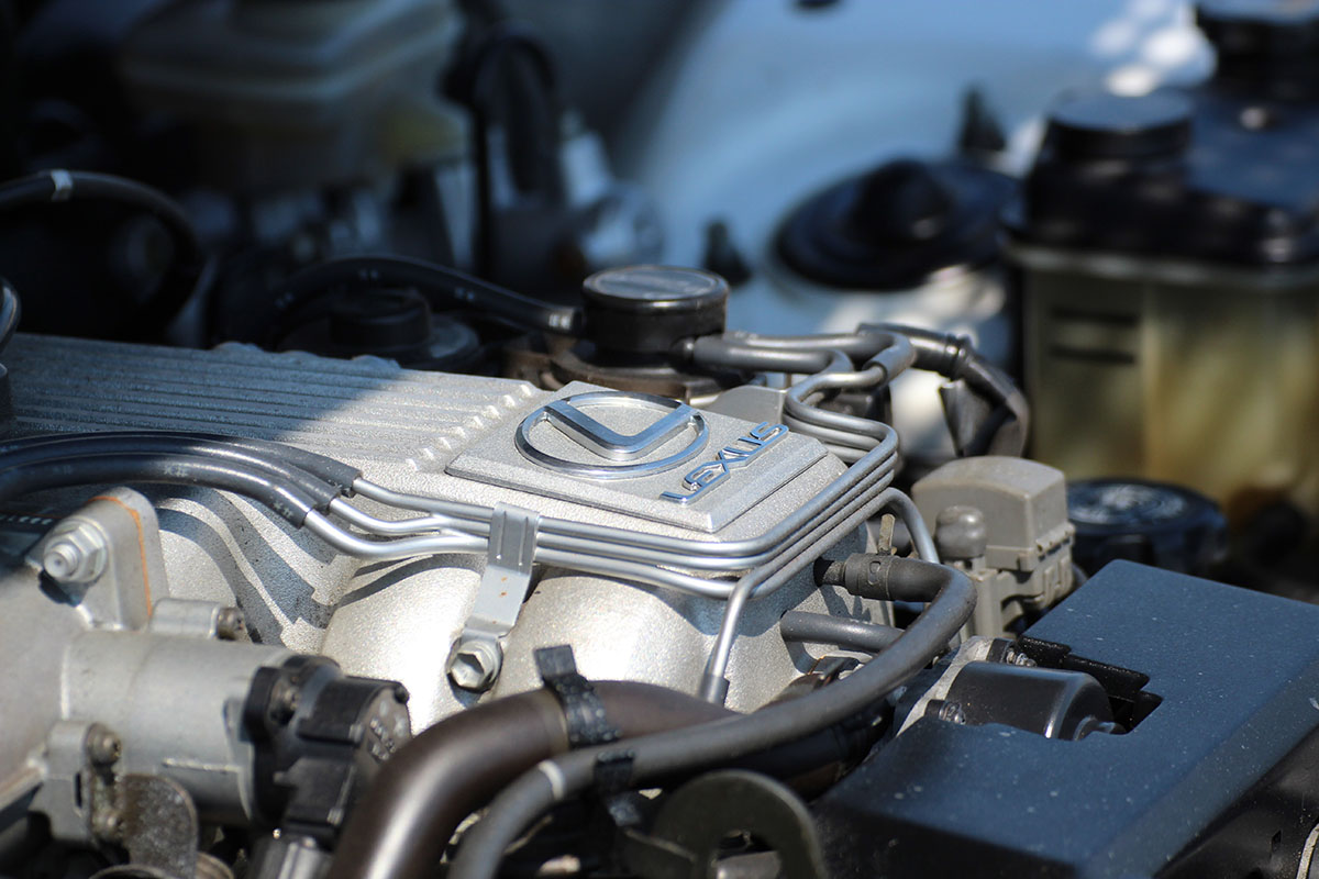 Oil being poured into engine during an oil change service