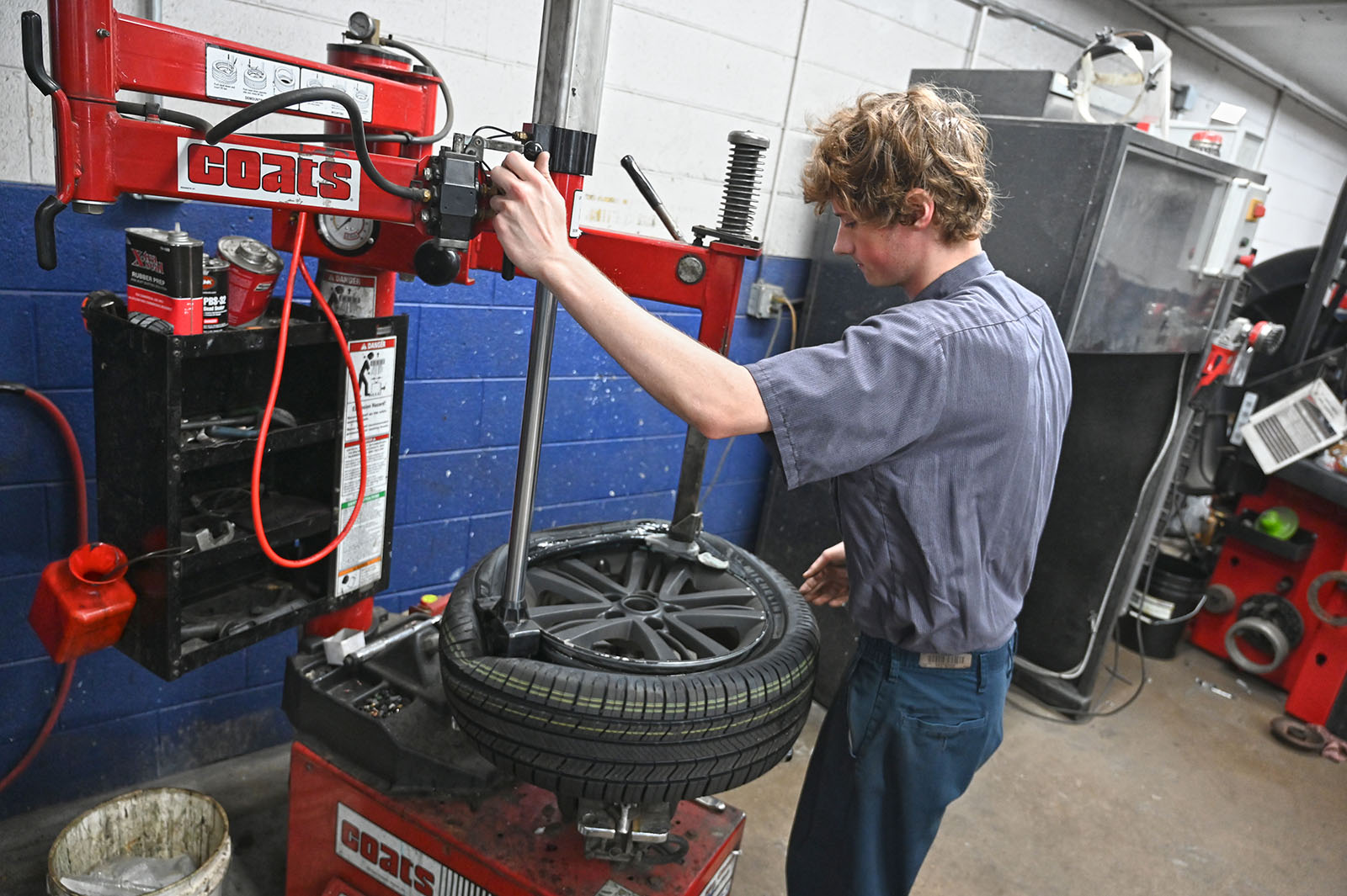 Oil being poured into engine during an oil change service