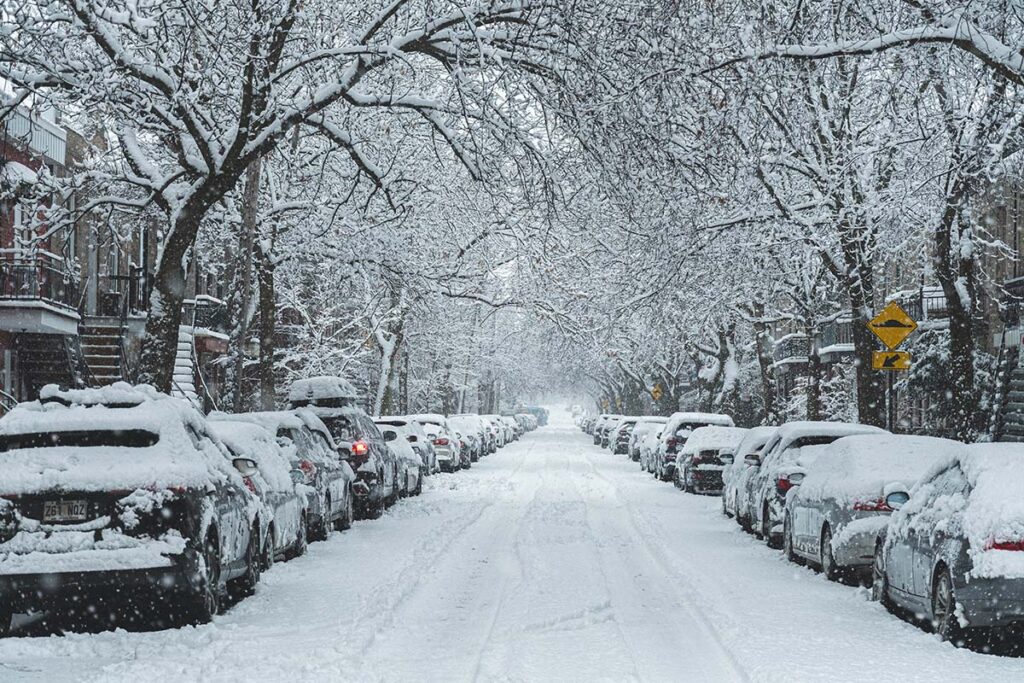cars-parked-on-snowy-road
