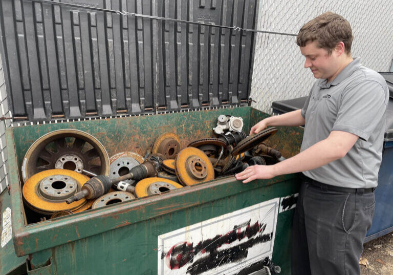 matthews-tire-employee-recycling-old-auto-parts