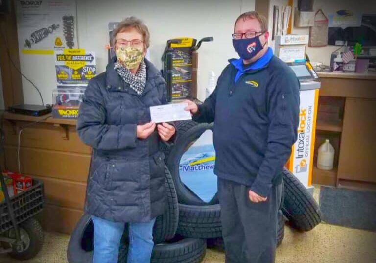 matthews-tire-presents-donation-to-food-bank
