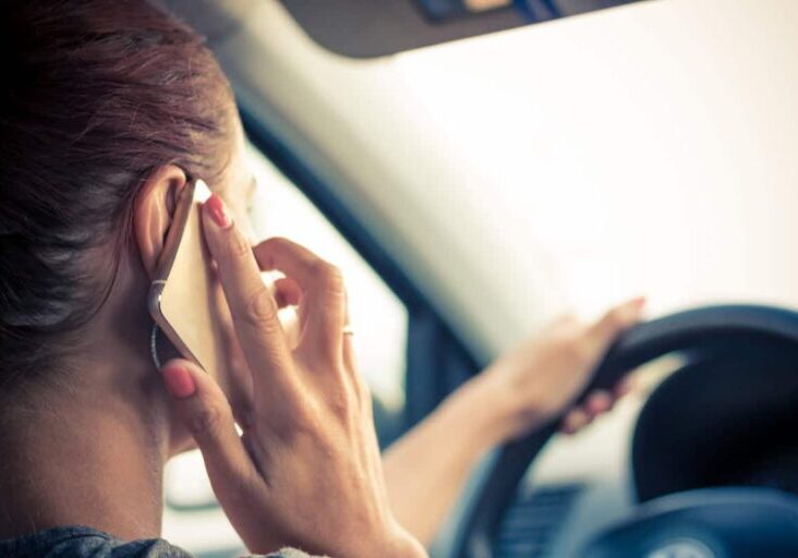 woman-talking-on-phone-while-driving